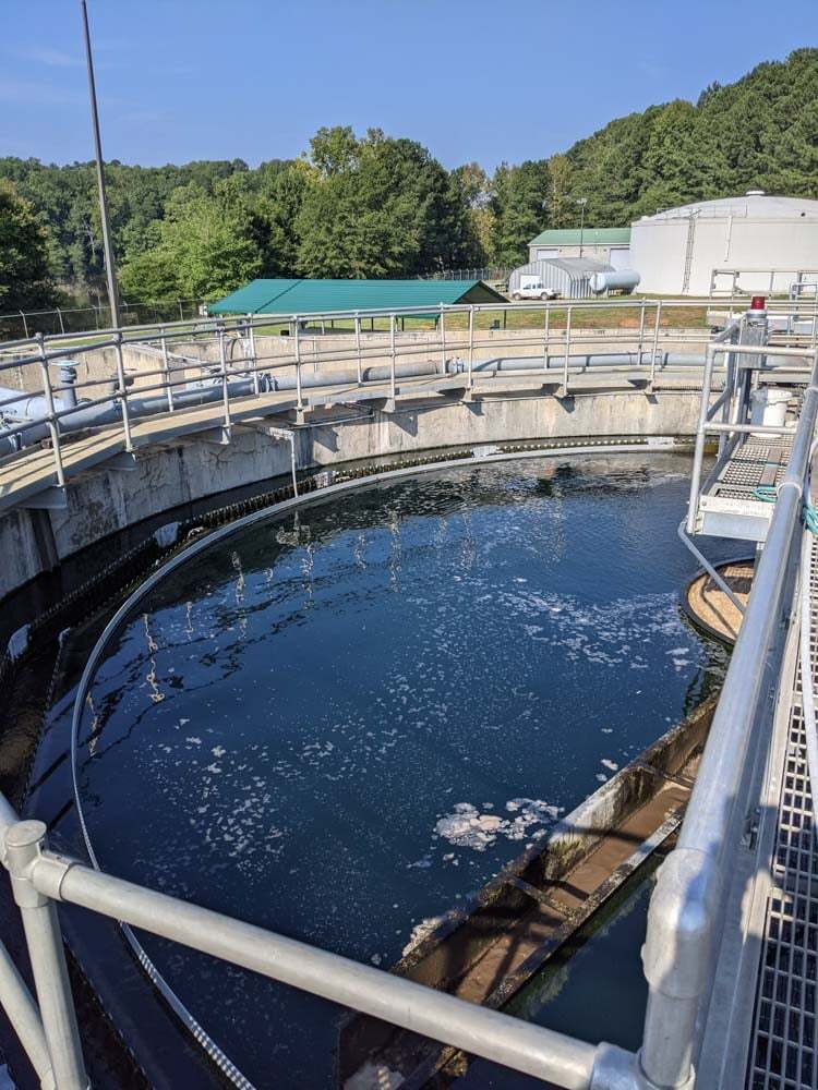 A clarifier at a wastewater treatment plant