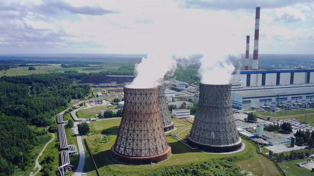 nuclear-power-plant-large-pipes-from-which-steam-clouds